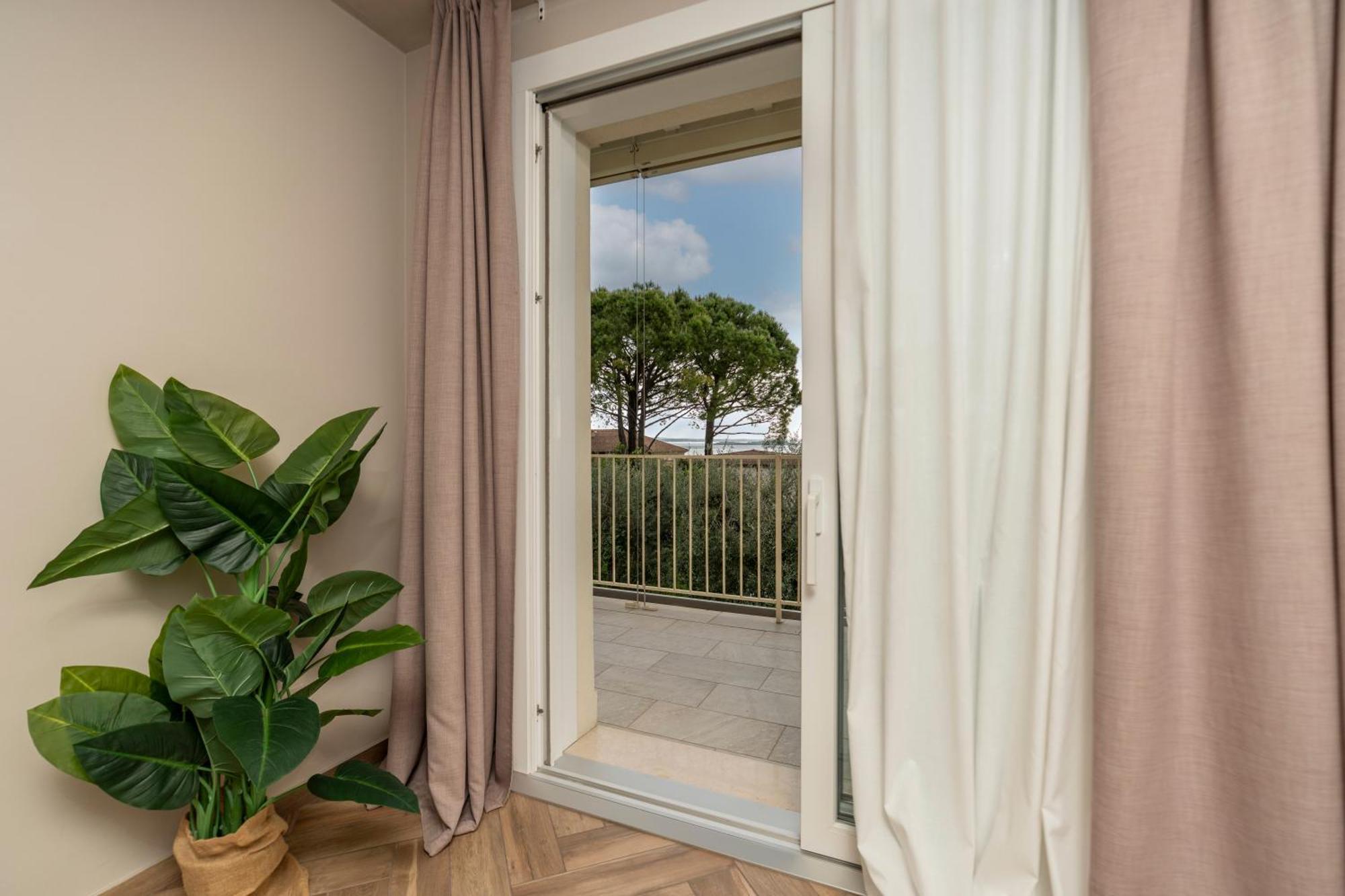 Bed & Breakfast La Home And Apartments モニーガ・デル・ガルダ エクステリア 写真